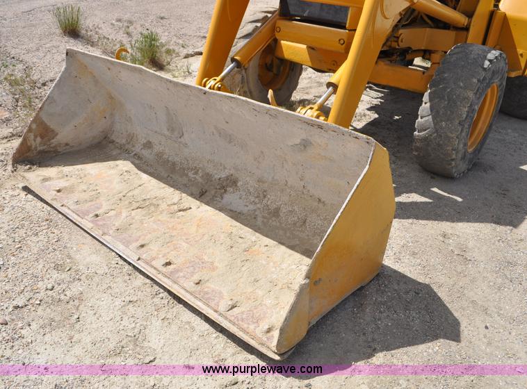 image for item F2004 John Deere 500C backhoe