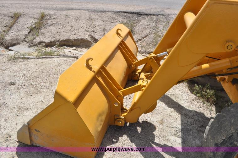 image for item F2004 John Deere 500C backhoe