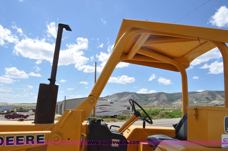 image for item F2004 John Deere 500C backhoe