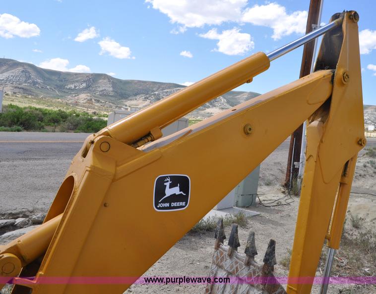 image for item F2004 John Deere 500C backhoe