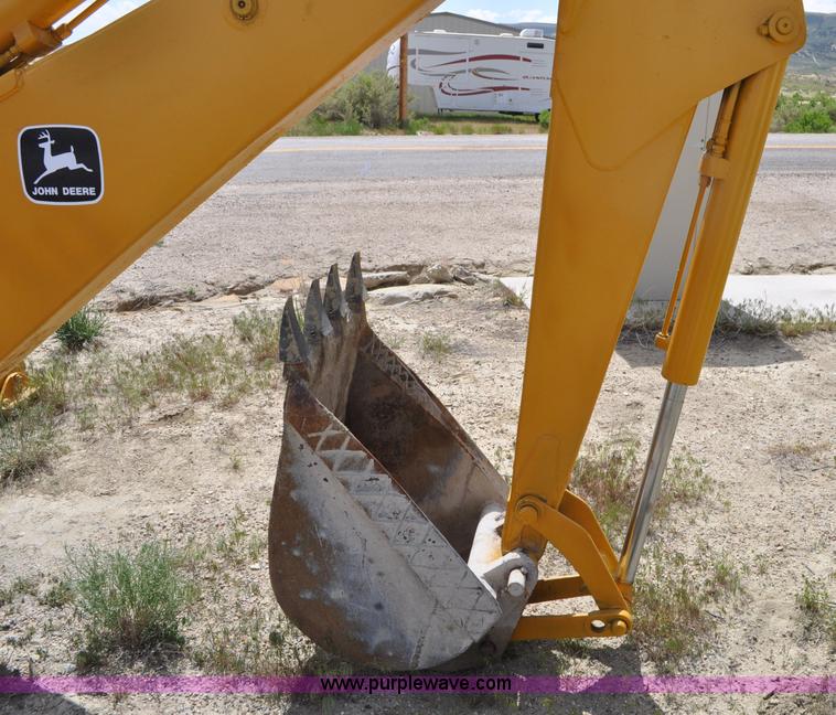 image for item F2004 John Deere 500C backhoe