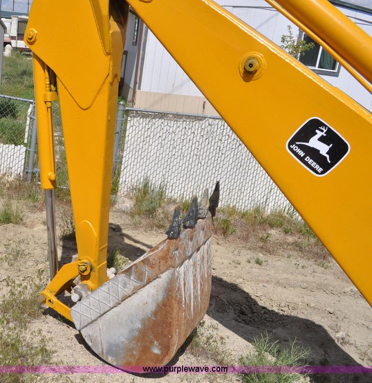 image for item F2004 John Deere 500C backhoe