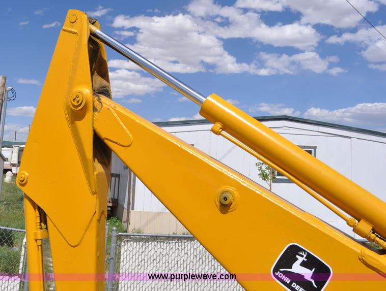 image for item F2004 John Deere 500C backhoe