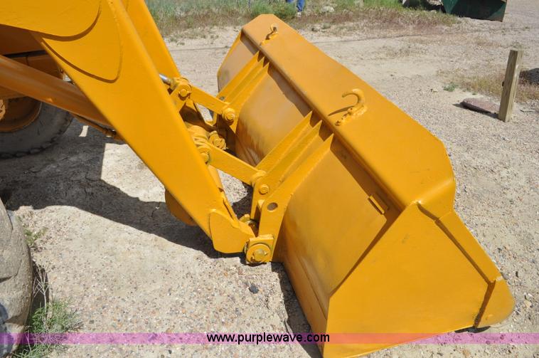 image for item F2004 John Deere 500C backhoe