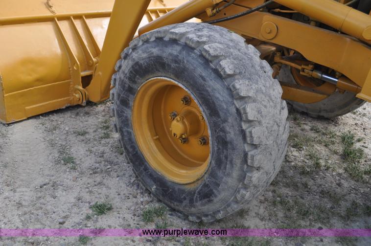 image for item F2004 John Deere 500C backhoe