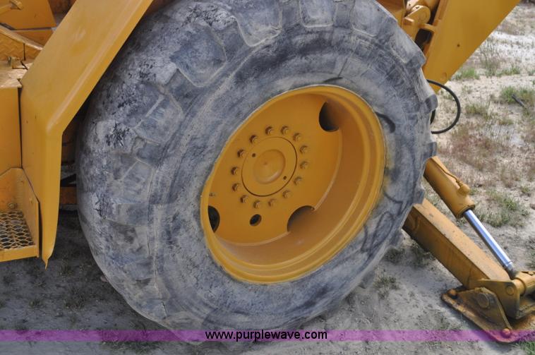 image for item F2004 John Deere 500C backhoe