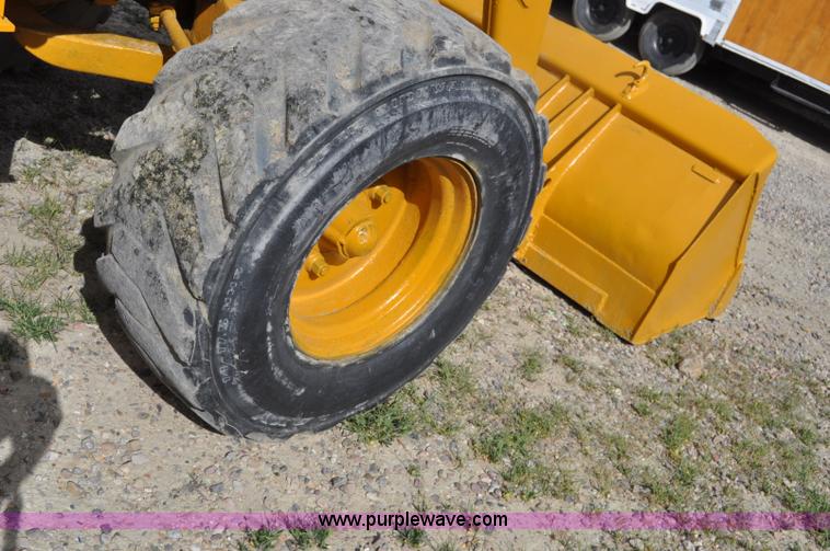 image for item F2004 John Deere 500C backhoe