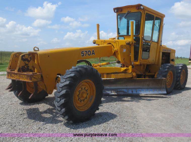 image for item F6999 1984 John Deere 570A articulated motor grader