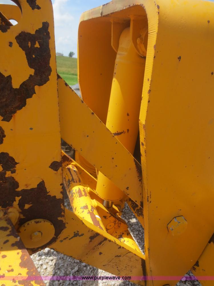 image for item F6999 1984 John Deere 570A articulated motor grader