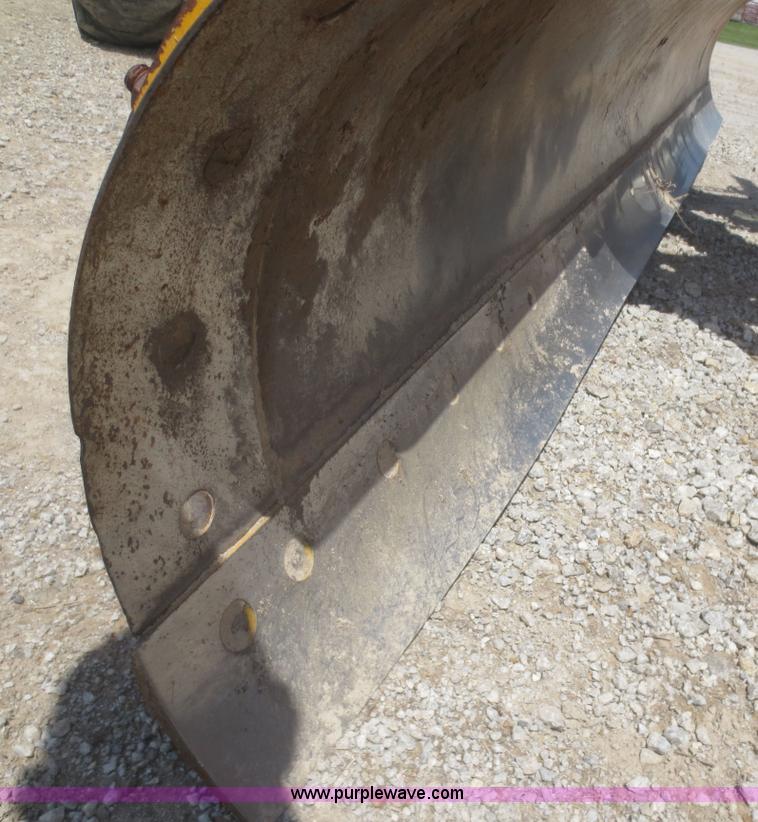 image for item F6999 1984 John Deere 570A articulated motor grader