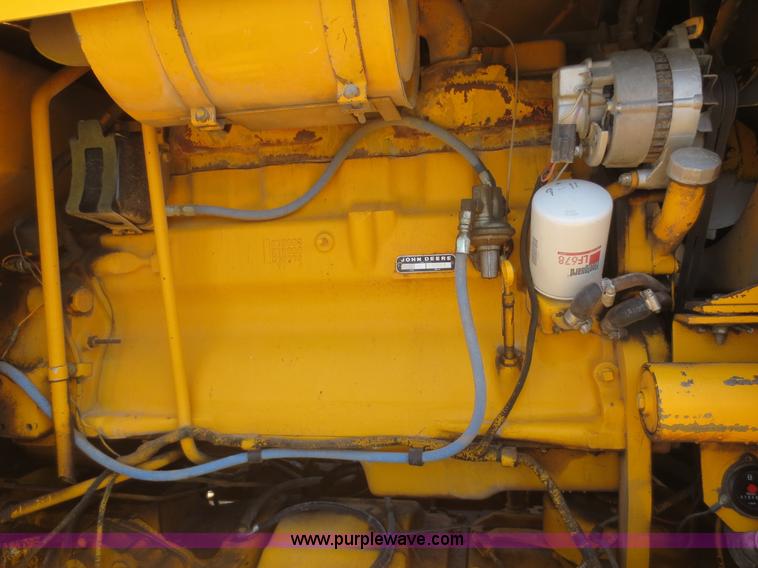 image for item F6999 1984 John Deere 570A articulated motor grader