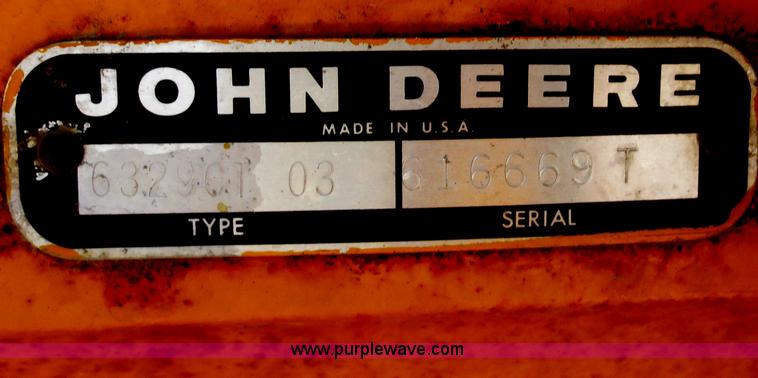 image for item F6999 1984 John Deere 570A articulated motor grader