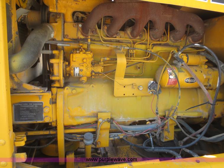 image for item F6999 1984 John Deere 570A articulated motor grader