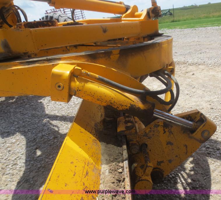 image for item F6999 1984 John Deere 570A articulated motor grader