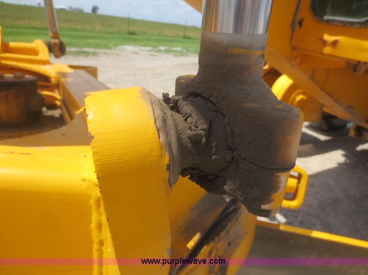 image for item F6999 1984 John Deere 570A articulated motor grader