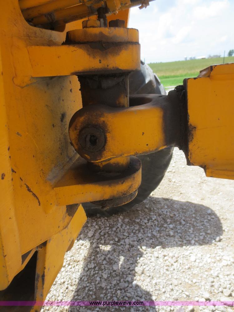 image for item F6999 1984 John Deere 570A articulated motor grader