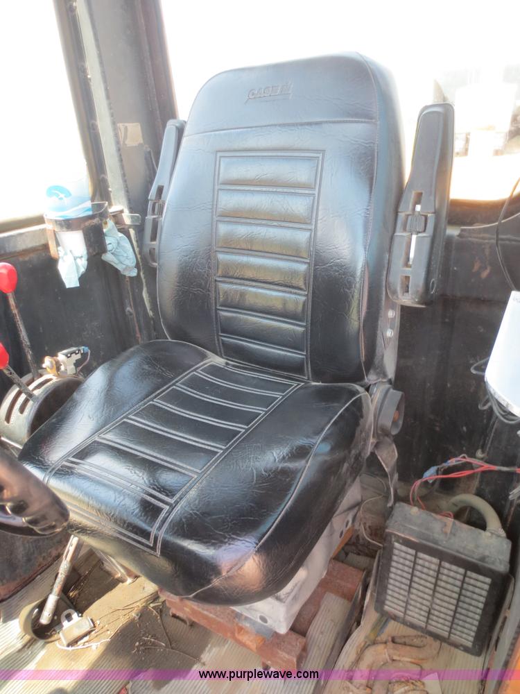 image for item F6999 1984 John Deere 570A articulated motor grader