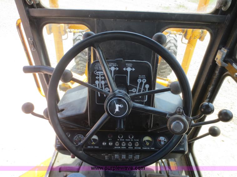 image for item F6999 1984 John Deere 570A articulated motor grader