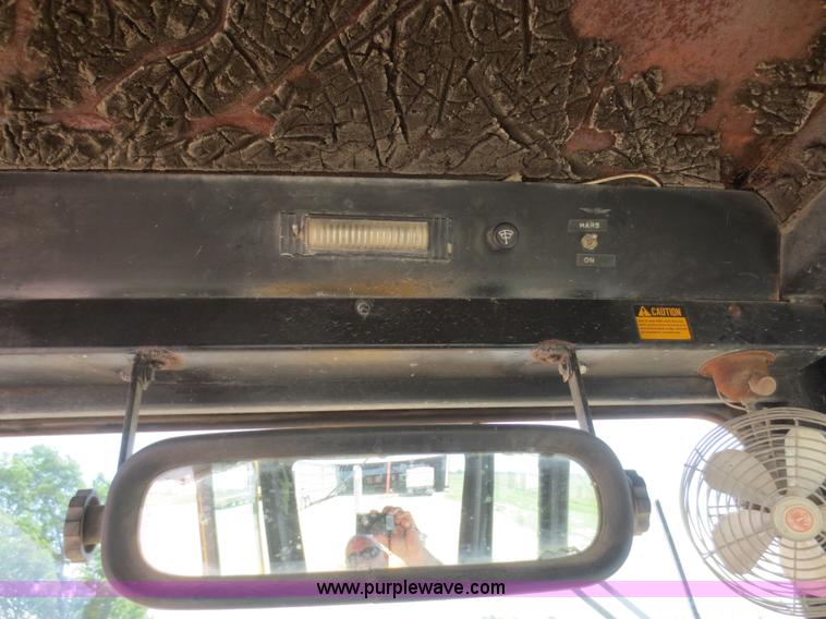 image for item F6999 1984 John Deere 570A articulated motor grader