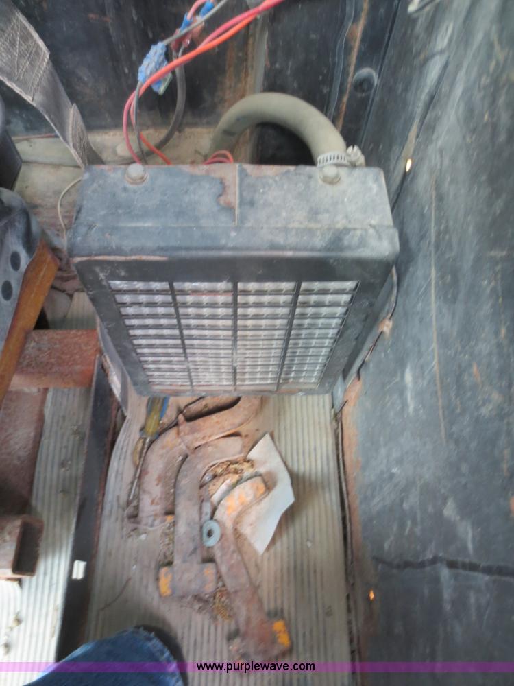 image for item F6999 1984 John Deere 570A articulated motor grader