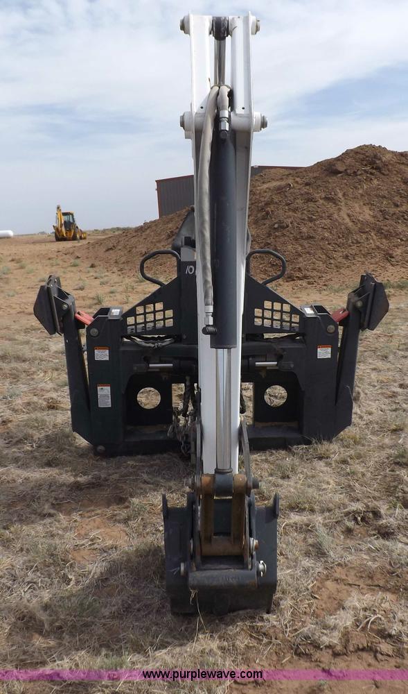 image for item H1895 Bobcat 8811 backhoe skid steer attachment