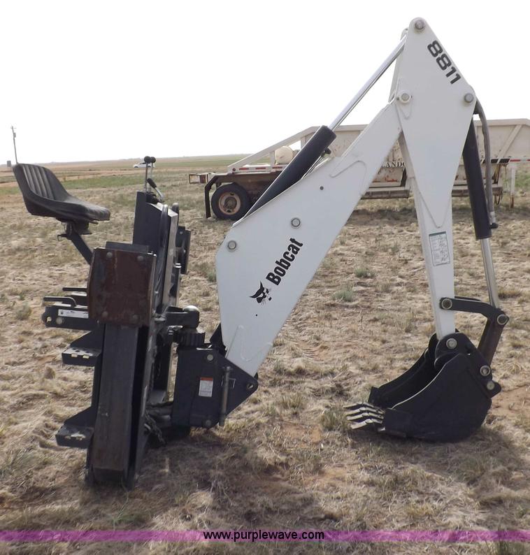 Bobcat 8811 backhoe skid steer attachment in Turpin, OK Item H1895
