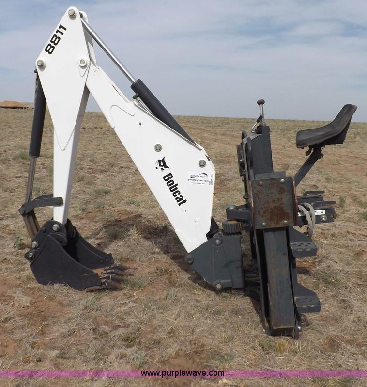 image for item H1895 Bobcat 8811 backhoe skid steer attachment