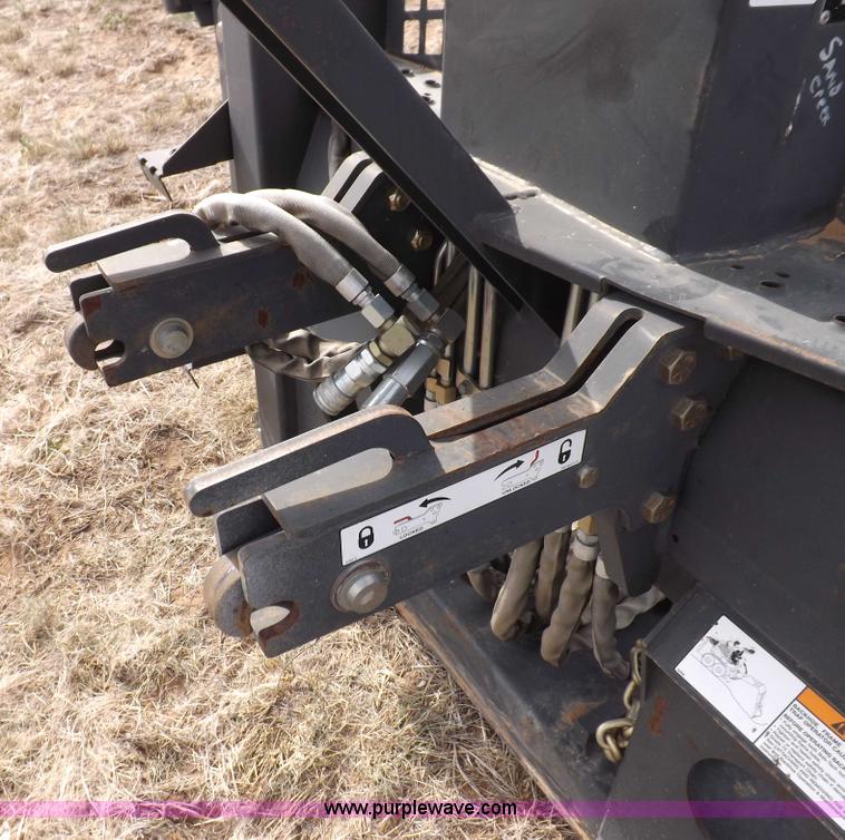 image for item H1895 Bobcat 8811 backhoe skid steer attachment