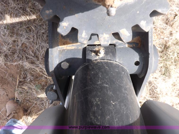 image for item H1895 Bobcat 8811 backhoe skid steer attachment