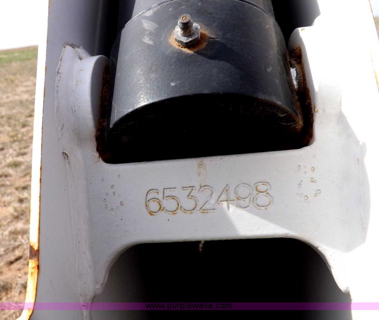 image for item H1895 Bobcat 8811 backhoe skid steer attachment