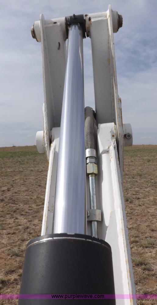 image for item H1895 Bobcat 8811 backhoe skid steer attachment