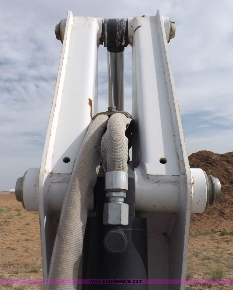 image for item H1895 Bobcat 8811 backhoe skid steer attachment