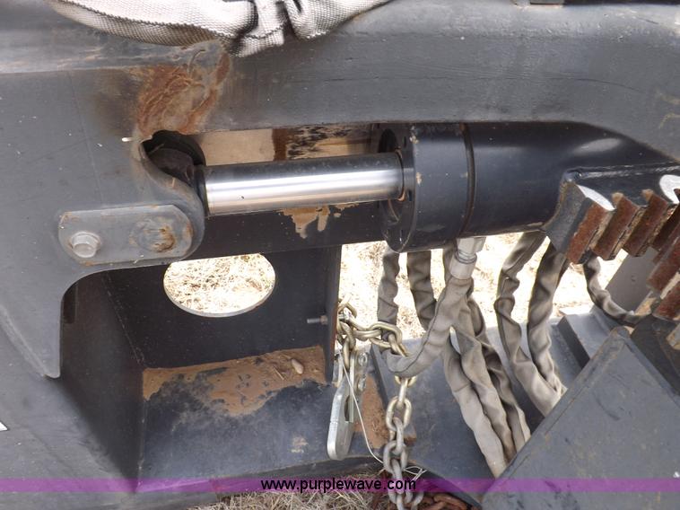 image for item H1895 Bobcat 8811 backhoe skid steer attachment