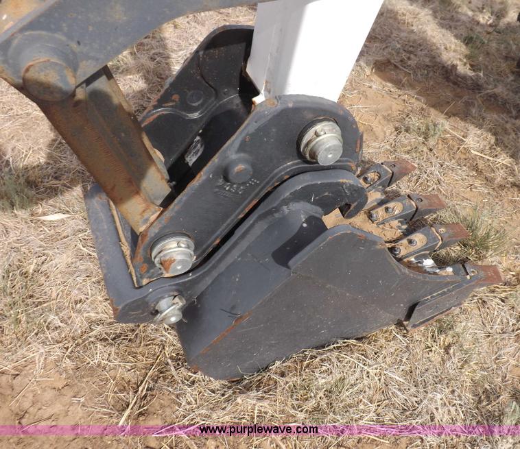 image for item H1895 Bobcat 8811 backhoe skid steer attachment