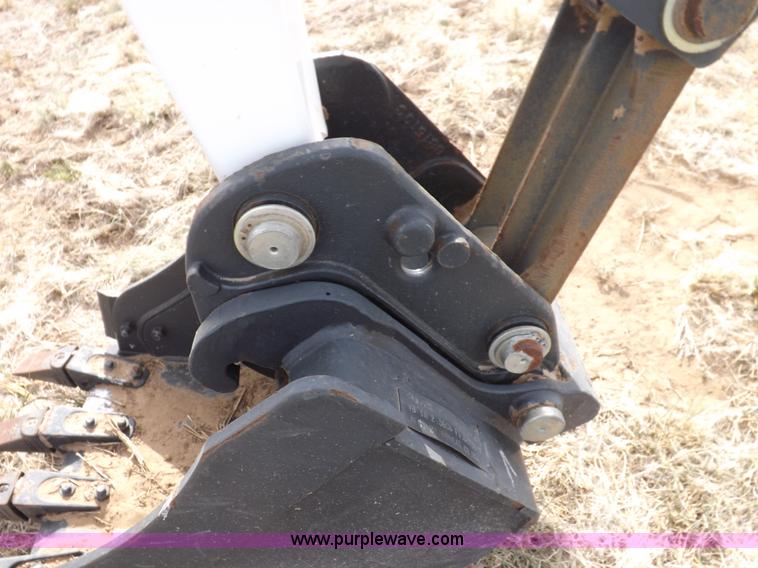 image for item H1895 Bobcat 8811 backhoe skid steer attachment