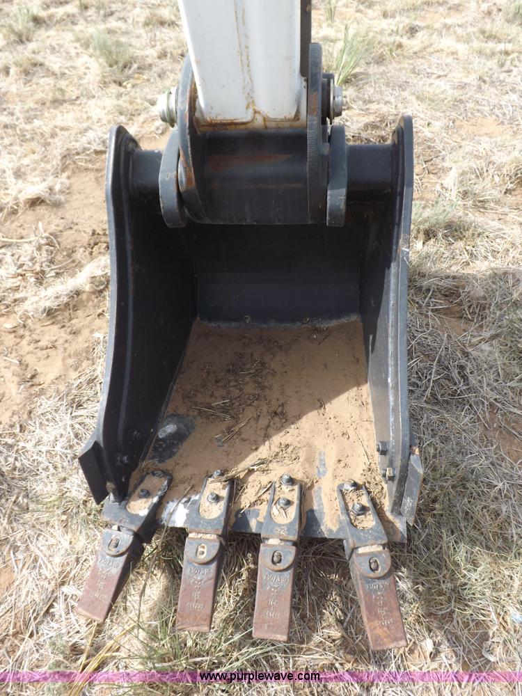 image for item H1895 Bobcat 8811 backhoe skid steer attachment