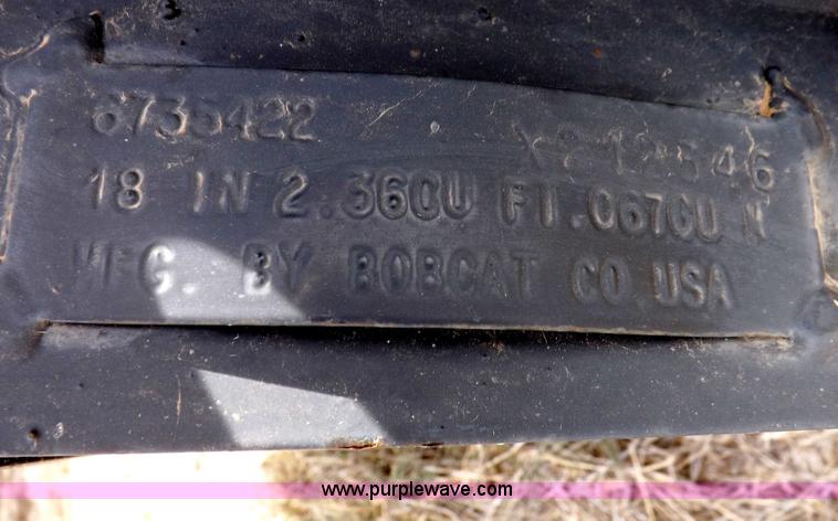 image for item H1895 Bobcat 8811 backhoe skid steer attachment