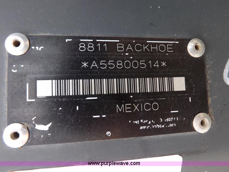 image for item H1895 Bobcat 8811 backhoe skid steer attachment