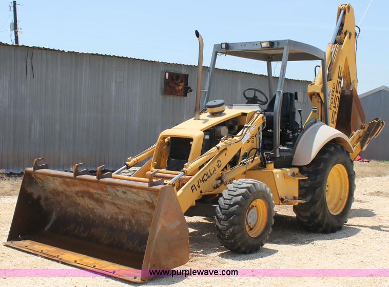 image for item H2989 1998 New Holland 555E backhoe