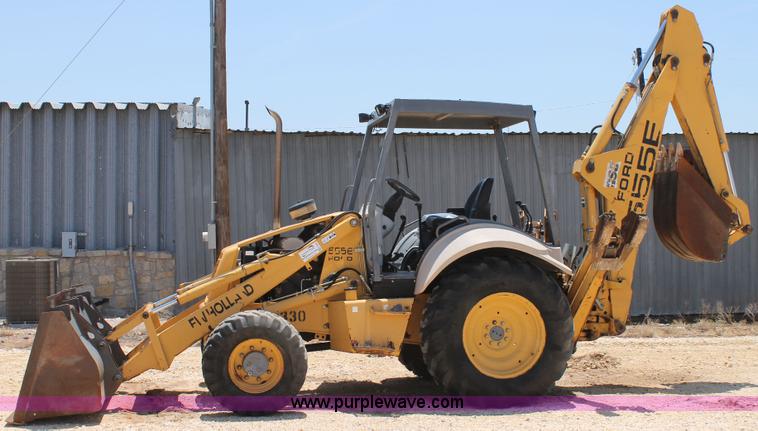 image for item H2989 1998 New Holland 555E backhoe