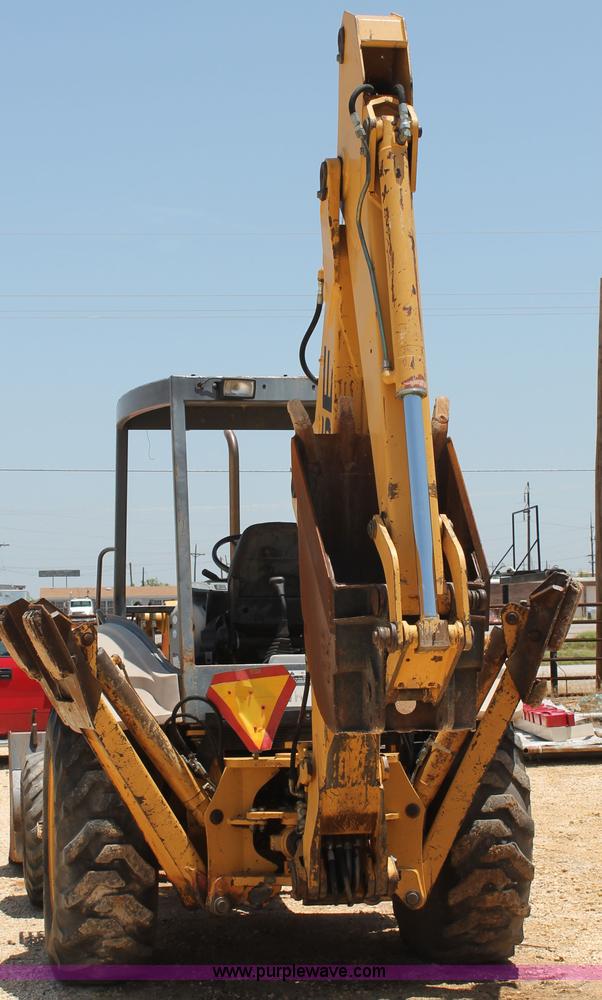 image for item H2989 1998 New Holland 555E backhoe