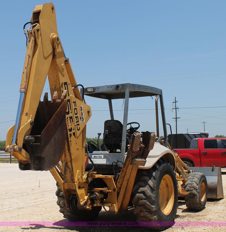 image for item H2989 1998 New Holland 555E backhoe