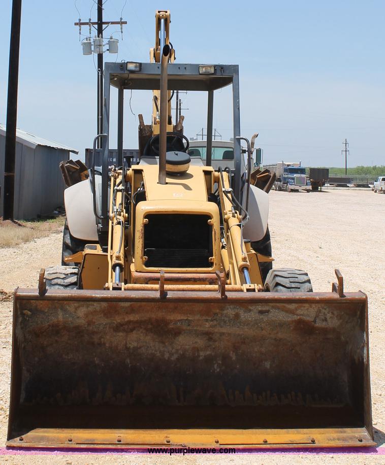 image for item H2989 1998 New Holland 555E backhoe