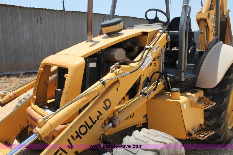 image for item H2989 1998 New Holland 555E backhoe