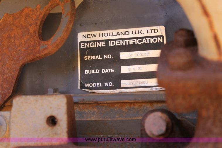 image for item H2989 1998 New Holland 555E backhoe