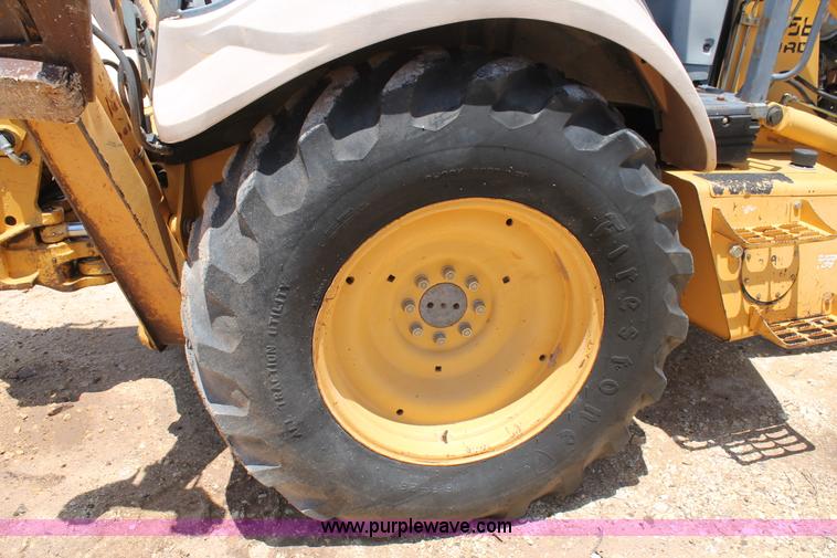 image for item H2989 1998 New Holland 555E backhoe