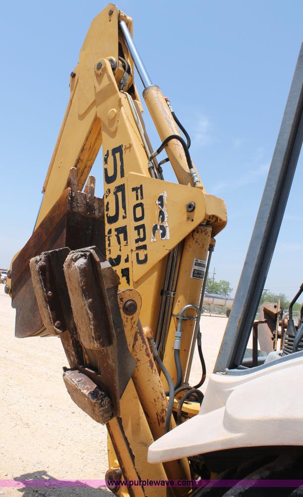 image for item H2989 1998 New Holland 555E backhoe