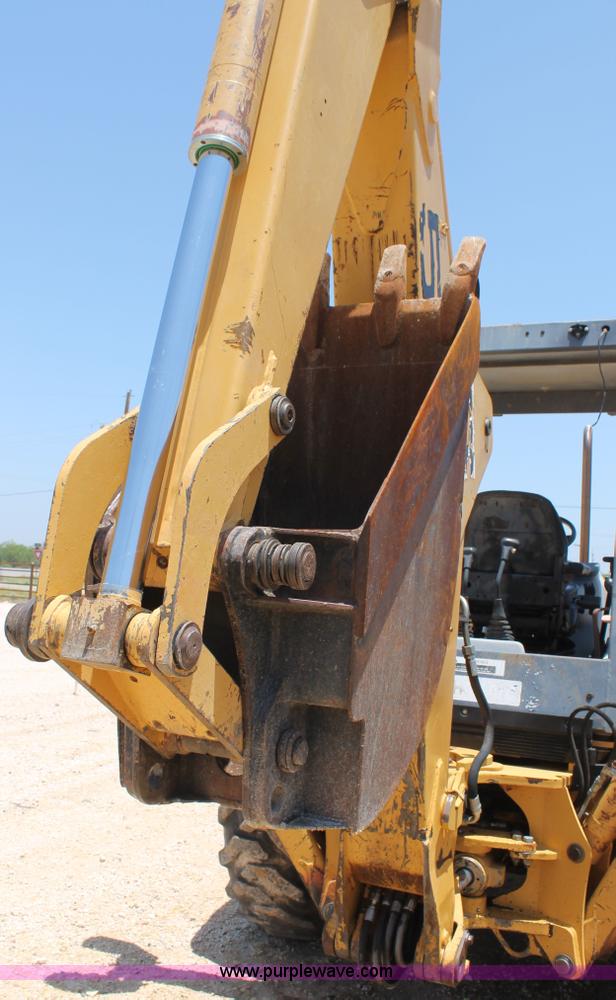 image for item H2989 1998 New Holland 555E backhoe