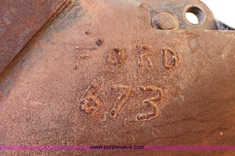 image for item H2989 1998 New Holland 555E backhoe