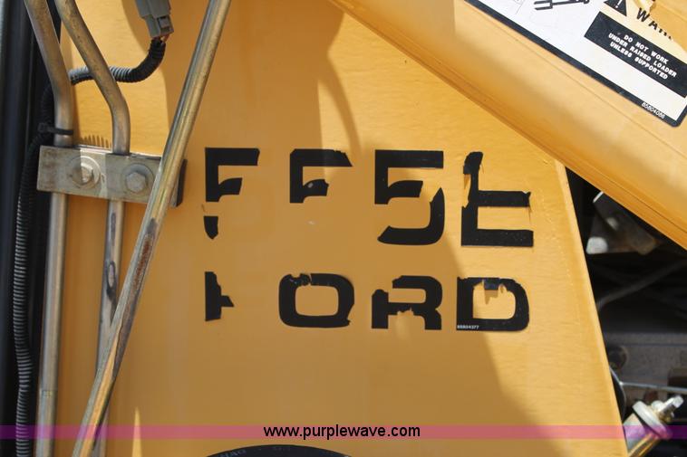 image for item H2989 1998 New Holland 555E backhoe